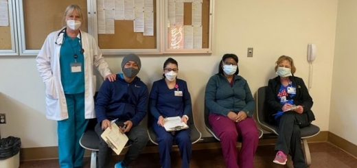 Patients and doctor in a waiting room.